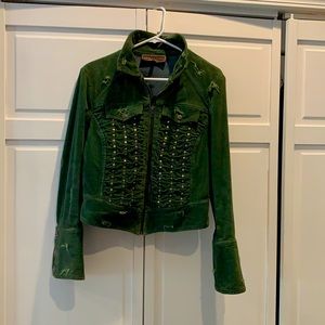Excellent condition, corduroy jacket. Metal studded front, metal button cuffs.